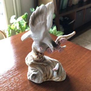 Vintage Bird vs Snake figurine